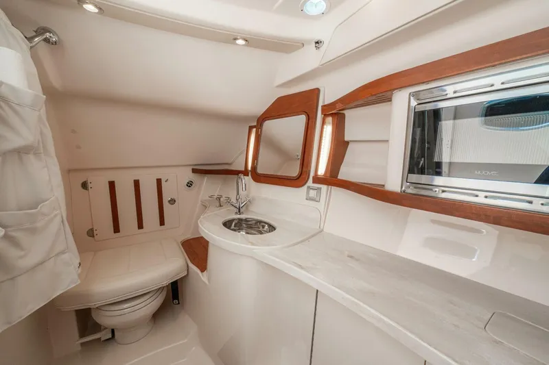 Dos Amigos Yacht Photos Pics 2020 Grady-White Freedom 375 boat interior with modern bathroom amenities.