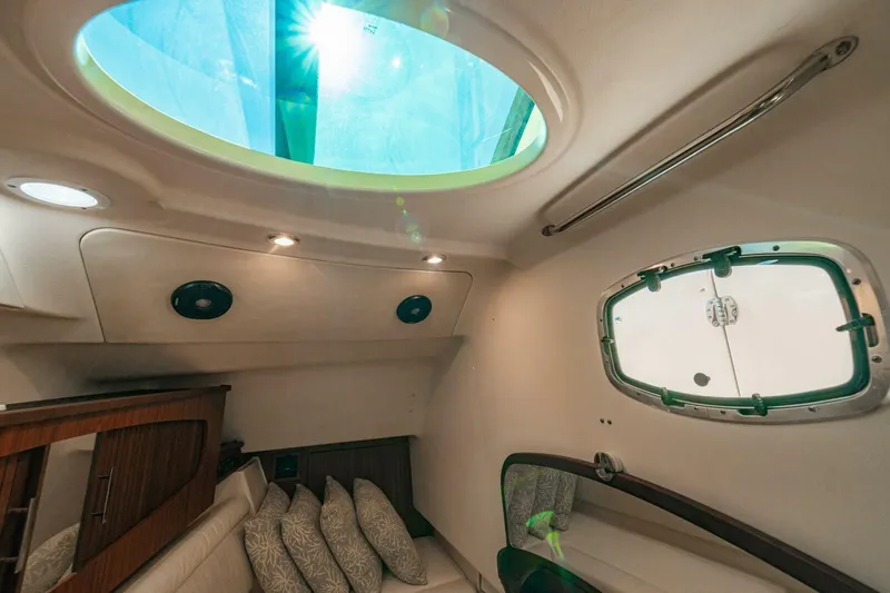 Dos Amigos Yacht Photos Pics Interior cabin of 2020 Grady-White Freedom 375 boat with skylight and cushions.