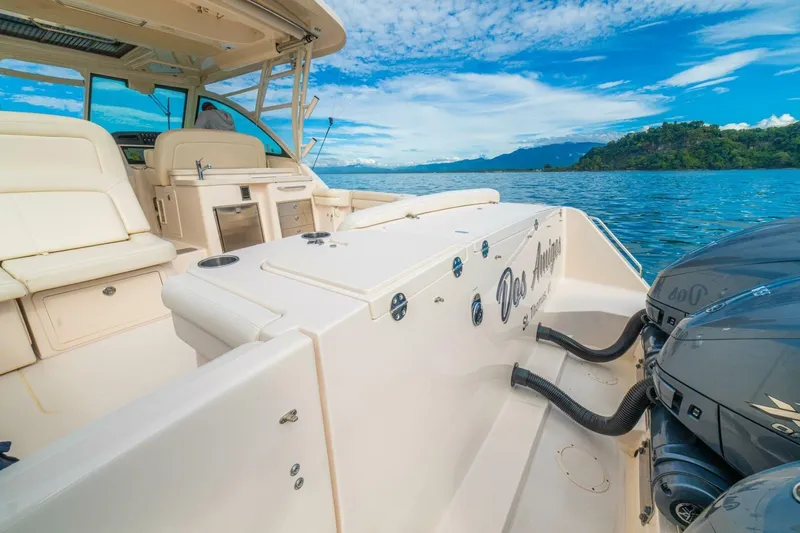 Dos Amigos Yacht Photos Pics 2020 Grady-White Freedom 375 boat interior with ocean view and twin engines.