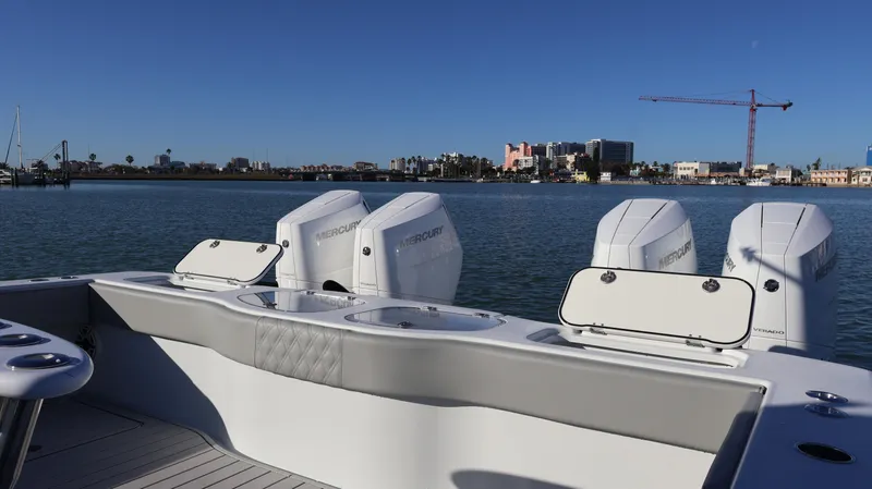  Yacht Photos Pics Freeman 47 boat, 2021 model, with powerful engines, docked near a city skyline.