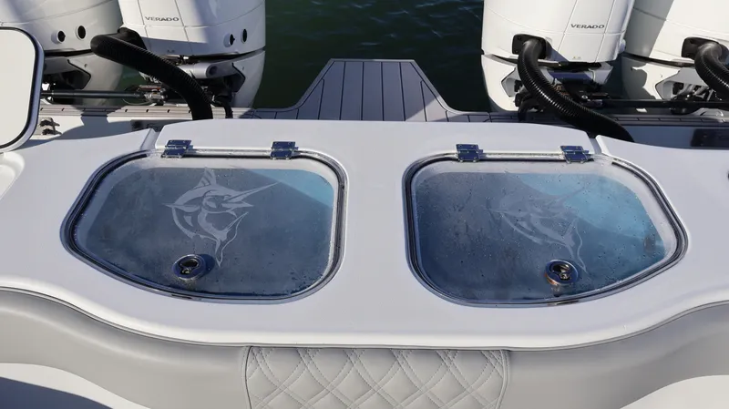  Yacht Photos Pics Freeman 47 boat livewells with marlin design, 2021 model, featuring dual outboard engines.