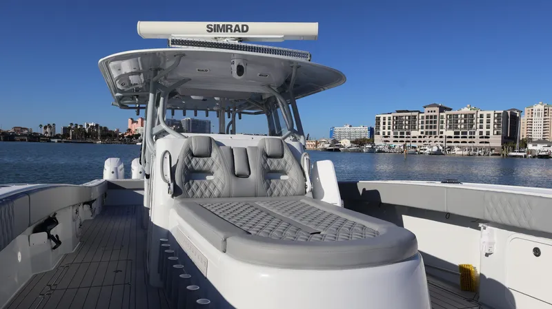  Yacht Photos Pics Luxury Freeman 47 boat, 2021 model, with sleek design and spacious deck, docked by waterfront.