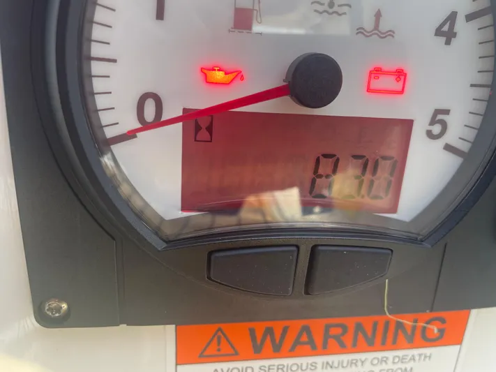 Cutting Edge Yacht Photos Pics Close-up of a Beneteau Oceanis 34.1 2023 dashboard with warning lights illuminated.