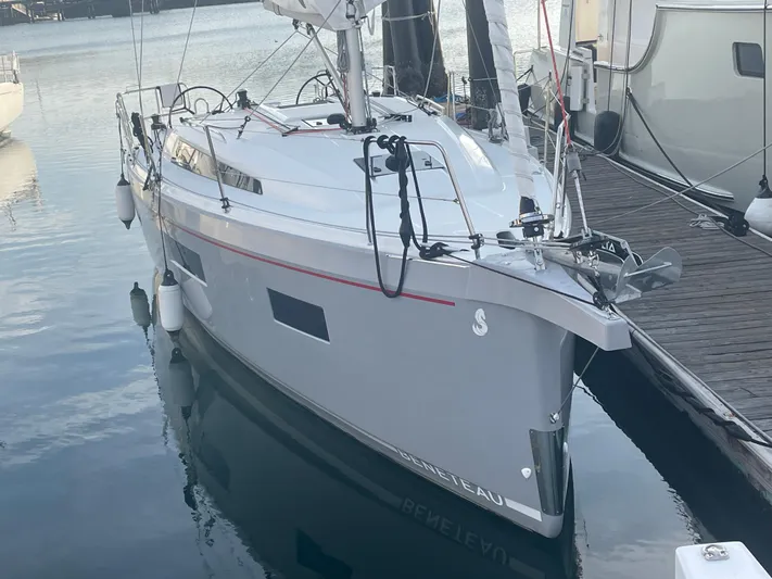 Cutting Edge Yacht Photos Pics 2023 Beneteau Oceanis 34.1 sailboat docked in a marina.