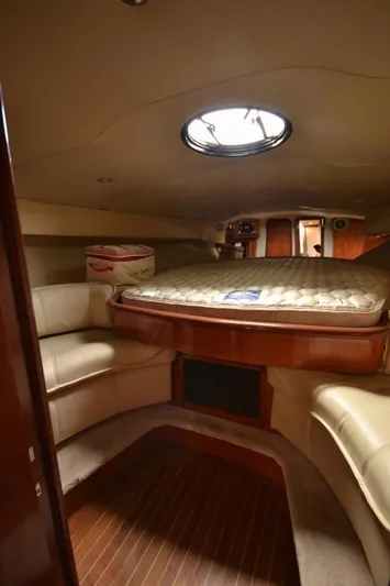  Yacht Photos Pics Interior of 2006 Fountain 48 Express Cruiser with cozy cabin and circular skylight.