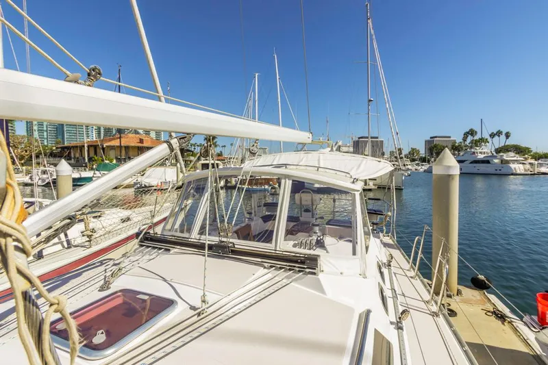 Kia Ora Yacht Photos Pics Catalina 385 sailboat docked in marina, clear sky, 2014 model.