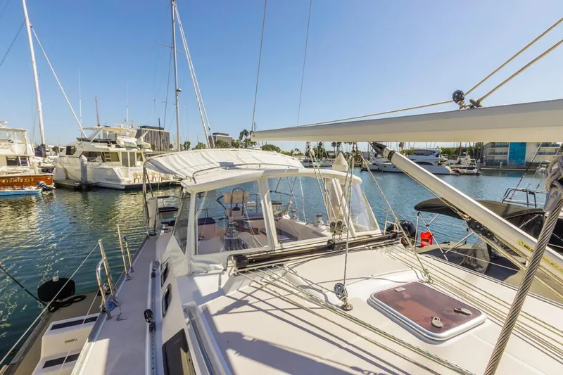 Kia Ora Yacht Photos Pics Catalina 385 sailboat, 2014 model, docked in a sunny marina.