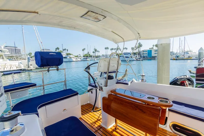 Kia Ora Yacht Photos Pics Catalina 385 sailboat interior, 2014 model, featuring a spacious cockpit with marina view.