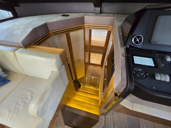  Yacht Photos Pics Luxurious interior of 2015 Absolute 56 FLY yacht with elegant staircase and modern design.