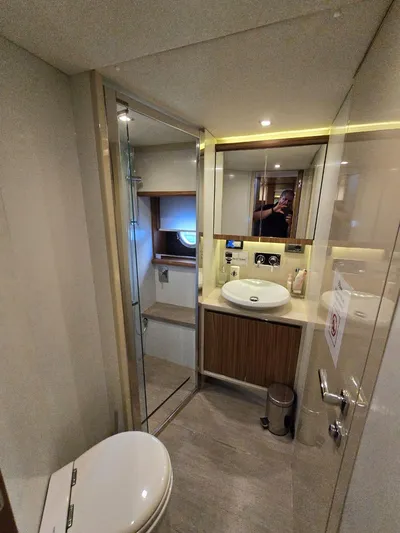  Yacht Photos Pics Luxurious bathroom in 2015 Absolute 56 FLY yacht with modern fixtures and elegant design.