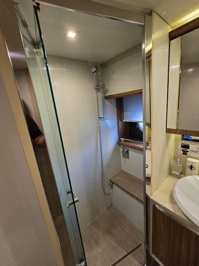  Yacht Photos Pics Luxurious bathroom in 2015 Absolute 56 FLY yacht with modern shower and sleek design.