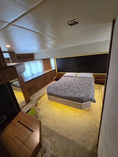  Yacht Photos Pics Luxurious bedroom in 2015 Absolute 56 FLY yacht with modern decor and ambient lighting.