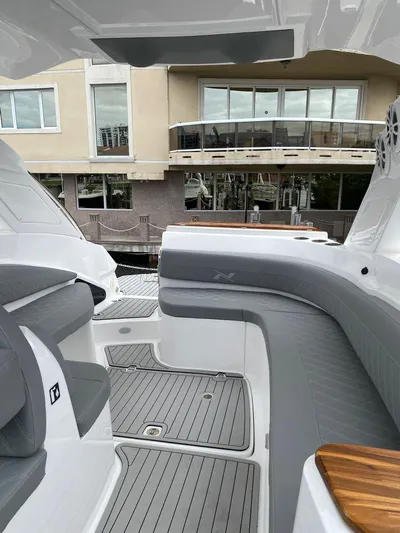  Yacht Photos Pics 2024 NX Boats 280 Xtreme interior with sleek gray seating and modern design.