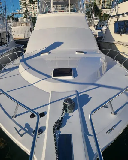  Yacht Photos Pics Ocean Yachts 48, 2000 model, docked in marina, sunny day.