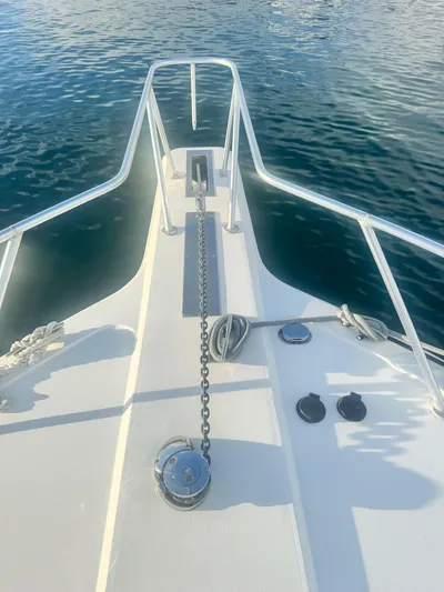  Yacht Photos Pics Bow of 2000 Ocean Yachts 48 on calm water.