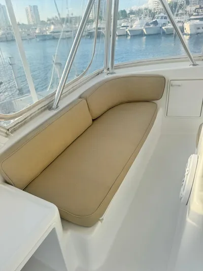  Yacht Photos Pics Ocean Yachts 48 (2000) interior seating with marina view.