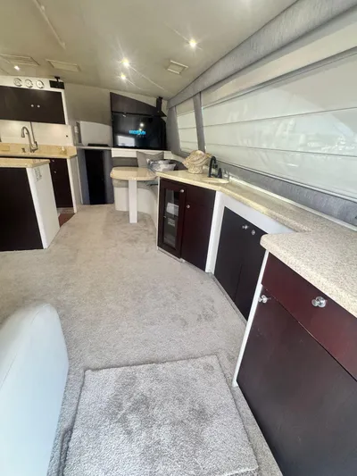  Yacht Photos Pics Interior of 2000 Ocean Yachts 48, featuring modern kitchen and seating area.