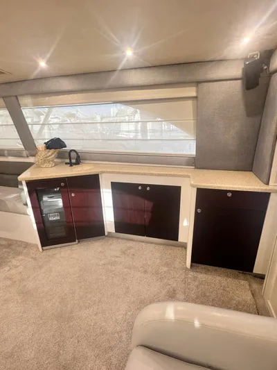  Yacht Photos Pics Interior of 2000 Ocean Yachts 48, featuring modern cabinetry and plush carpeting.