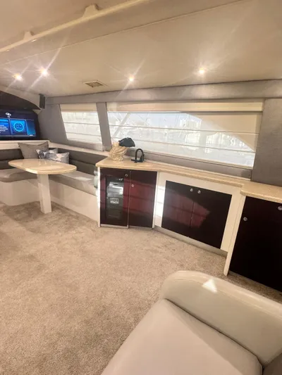  Yacht Photos Pics Luxurious interior of 2000 Ocean Yachts 48 with modern seating and entertainment area.