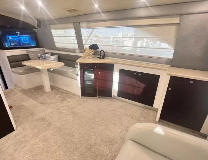  Yacht Photos Pics Luxurious interior of 2000 Ocean Yachts 48 with modern seating and entertainment area.