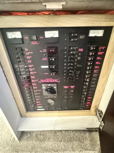  Yacht Photos Pics Electrical panel of a 2000 Ocean Yachts 48 boat, featuring various switches and gauges.