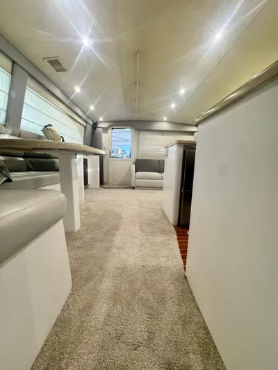  Yacht Photos Pics Interior of 2000 Ocean Yachts 48, featuring modern seating and ambient lighting.