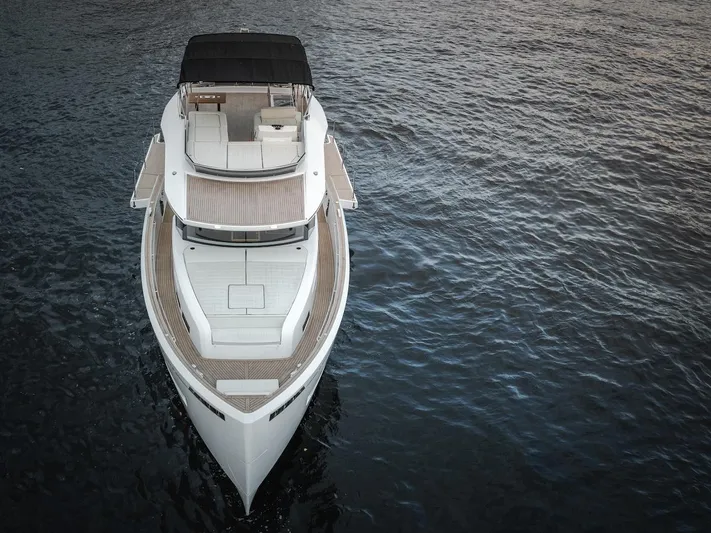  Yacht Photos Pics Aerial view of 2022 Pardo Yachts E60 luxury yacht on calm water.