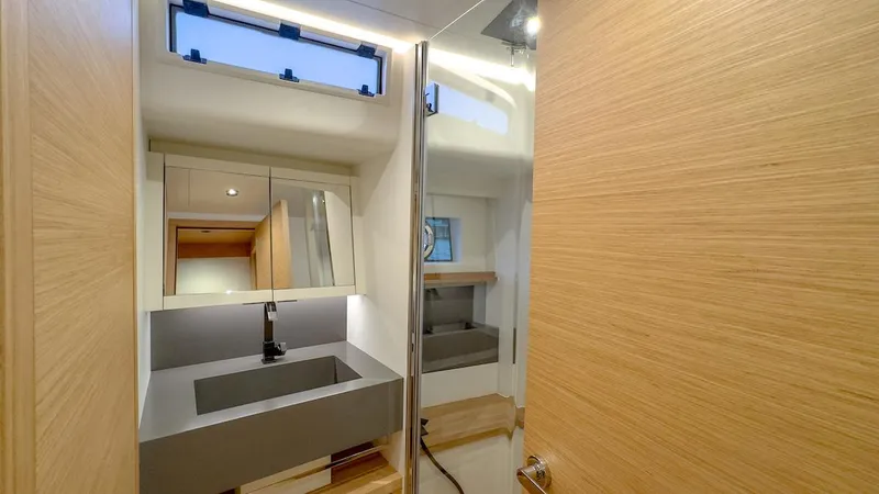  Yacht Photos Pics Modern bathroom interior of 2022 Pardo Yachts E60 with sleek design and natural lighting.