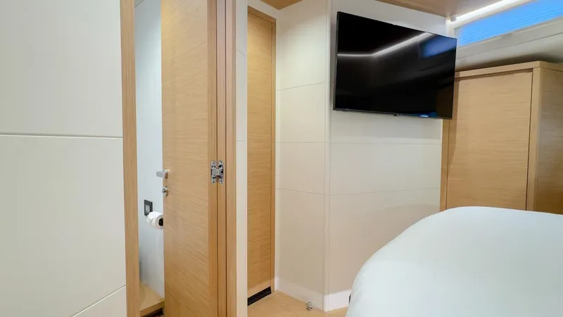  Yacht Photos Pics Interior of 2022 Pardo Yachts E60 with modern bedroom and bathroom.