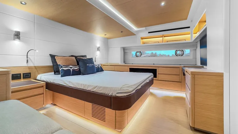  Yacht Photos Pics Luxurious 2022 Pardo Yachts E60 bedroom with modern design and elegant wood finishes.