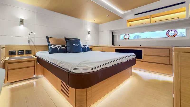  Yacht Photos Pics Luxurious 2022 Pardo Yachts E60 bedroom with modern design and ambient lighting.