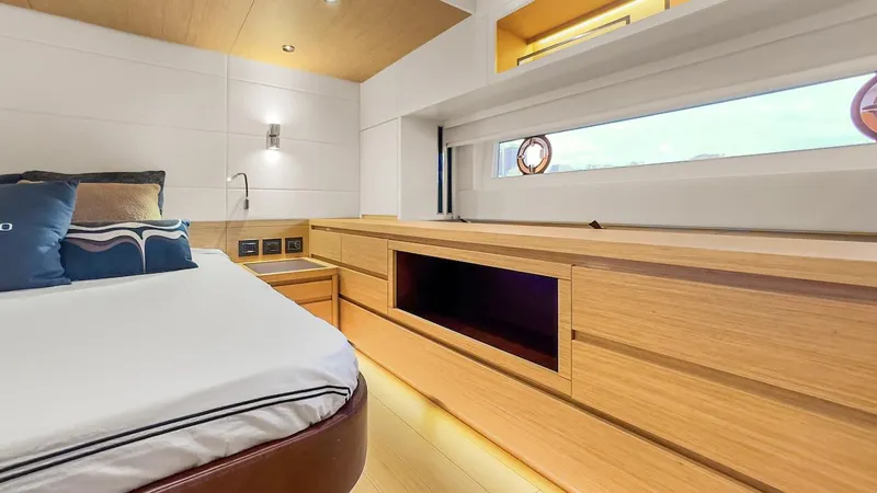  Yacht Photos Pics Luxurious interior of 2022 Pardo Yachts E60, featuring modern wood finishes and elegant design.