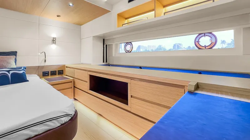  Yacht Photos Pics Luxurious interior of 2022 Pardo Yachts E60 with modern wood finishes and large window.