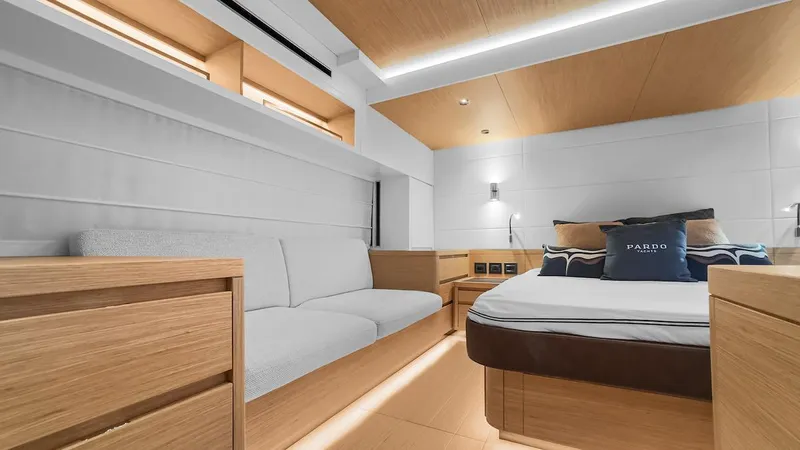  Yacht Photos Pics Luxurious interior of 2022 Pardo Yachts E60, featuring modern design and cozy furnishings.