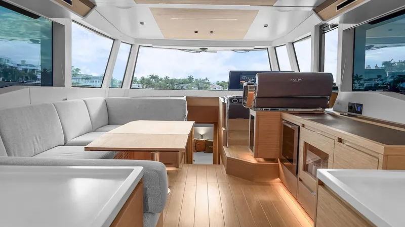  Yacht Photos Pics Luxurious interior of 2022 Pardo Yachts E60 with modern furnishings and panoramic windows.
