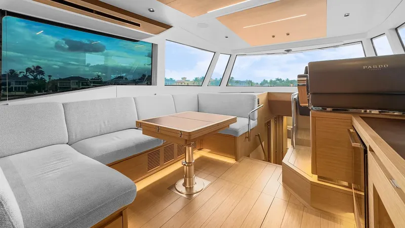  Yacht Photos Pics Luxurious interior of 2022 Pardo Yachts E60 with modern seating and panoramic windows.