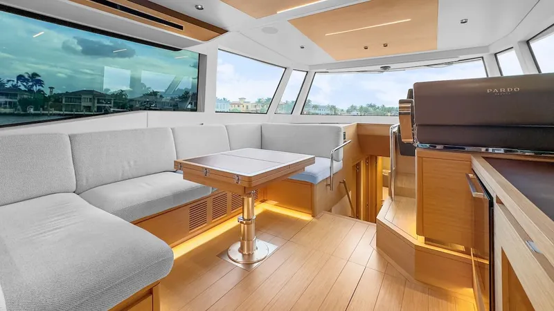  Yacht Photos Pics Luxurious interior of 2022 Pardo Yachts E60 with modern seating and panoramic windows.