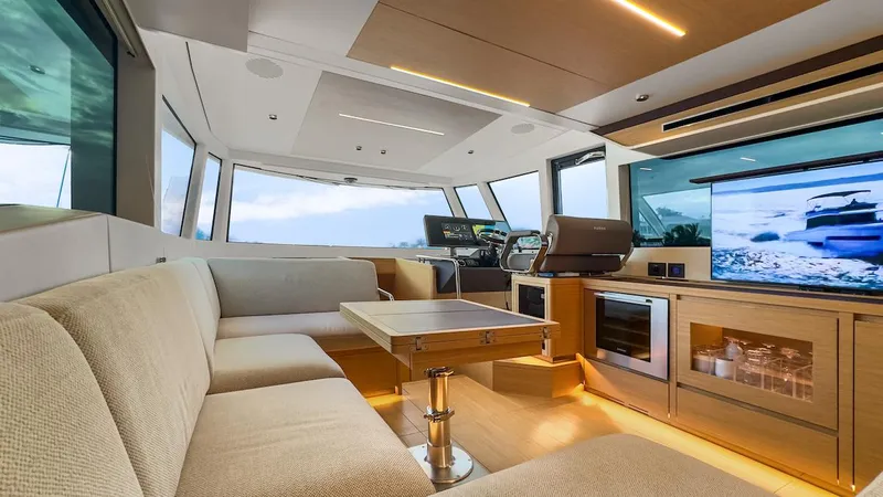  Yacht Photos Pics Luxurious interior of 2022 Pardo Yachts E60 with modern seating and navigation area.