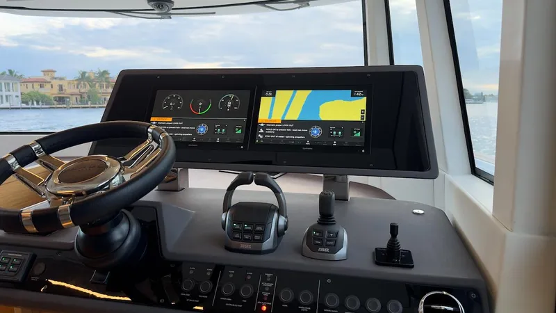  Yacht Photos Pics Interior helm of 2022 Pardo Yachts E60 with dual navigation screens and controls.