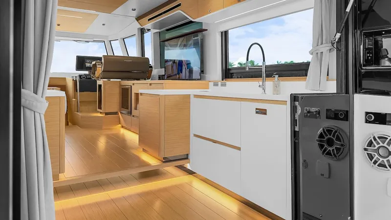  Yacht Photos Pics Luxurious interior of 2022 Pardo Yachts E60 with modern kitchen and sleek design.