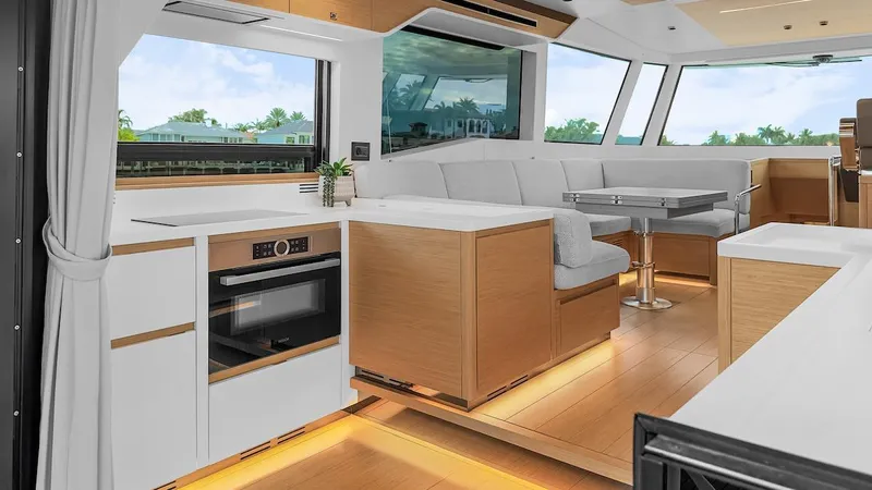  Yacht Photos Pics Luxurious interior of 2022 Pardo Yachts E60 with modern kitchen and seating area.