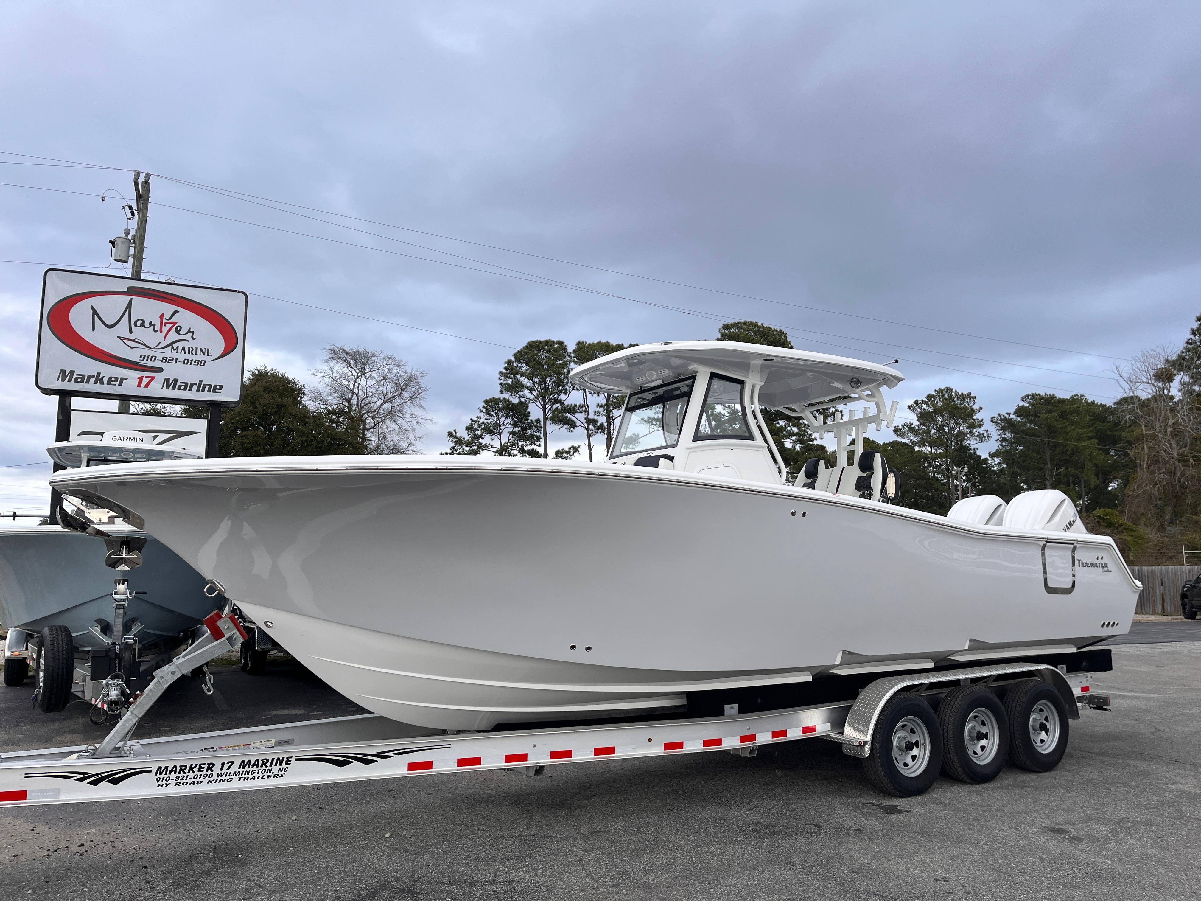 2025 Tidewater 302 CC Adventure boat on a trailer at Marker 17 Marine.