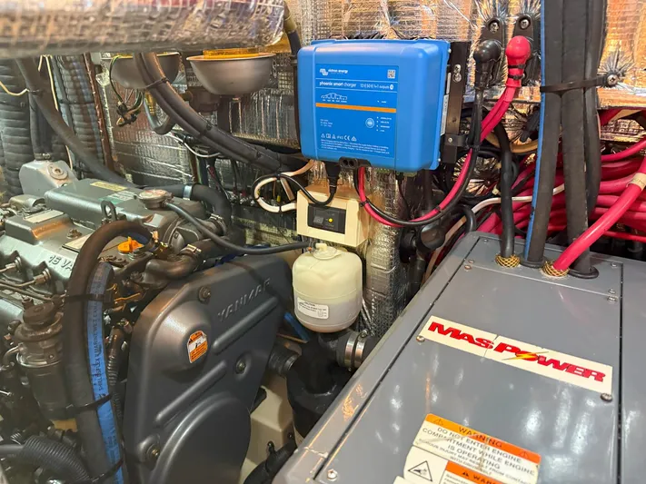  Yacht Photos Pics Engine room of 2008 Island Packet 465 yacht with Yanmar engine and electrical components.