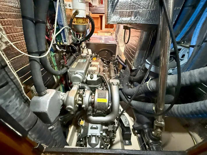  Yacht Photos Pics Engine room of a 2008 Island Packet 465 yacht, showcasing mechanical components and wiring.