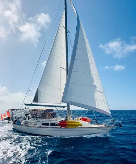  Yacht Photos Pics Sailing yacht Island Packet 465, 2008 model, cruising on open sea under clear skies.