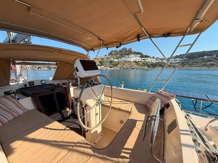  Yacht Photos Pics 2008 Island Packet 465 yacht cockpit with scenic coastal view.