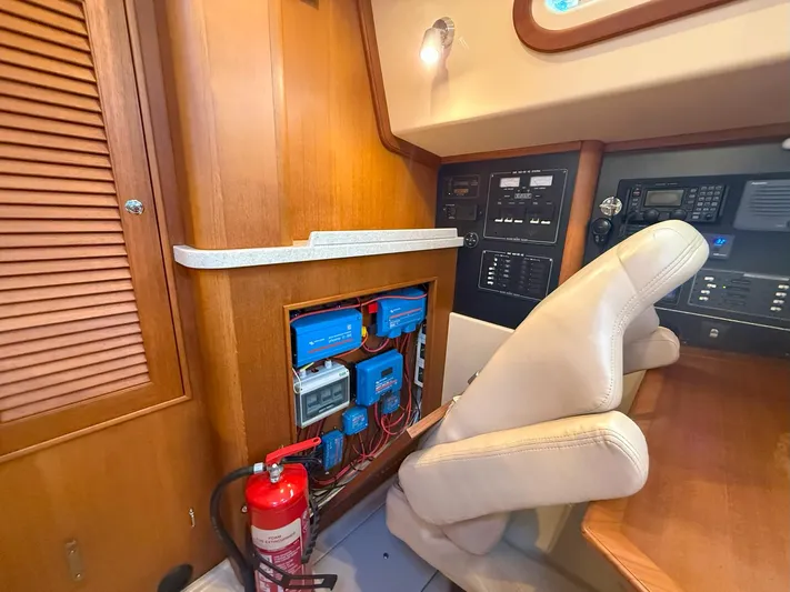  Yacht Photos Pics Interior of 2008 Island Packet 465 yacht showing electrical panel and fire extinguisher.