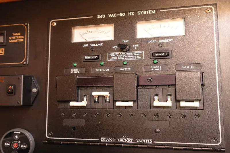  Yacht Photos Pics Electrical panel of 2008 Island Packet 465 yacht, featuring voltage and current controls.