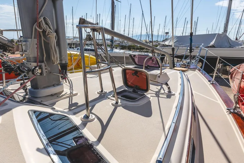  Yacht Photos Pics 2008 Island Packet 465 sailboat deck with open hatches and rigging in marina.