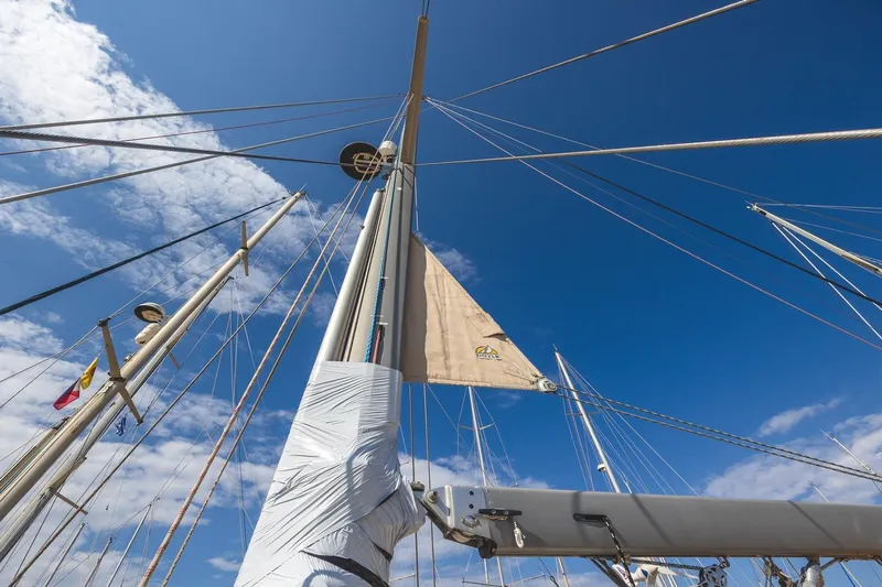  Yacht Photos Pics Sailboat mast and rigging of 2008 Island Packet 465 against a clear blue sky.